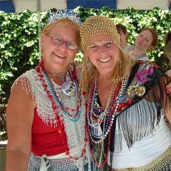 Mardi Gras beads on happy Jubilee visitors